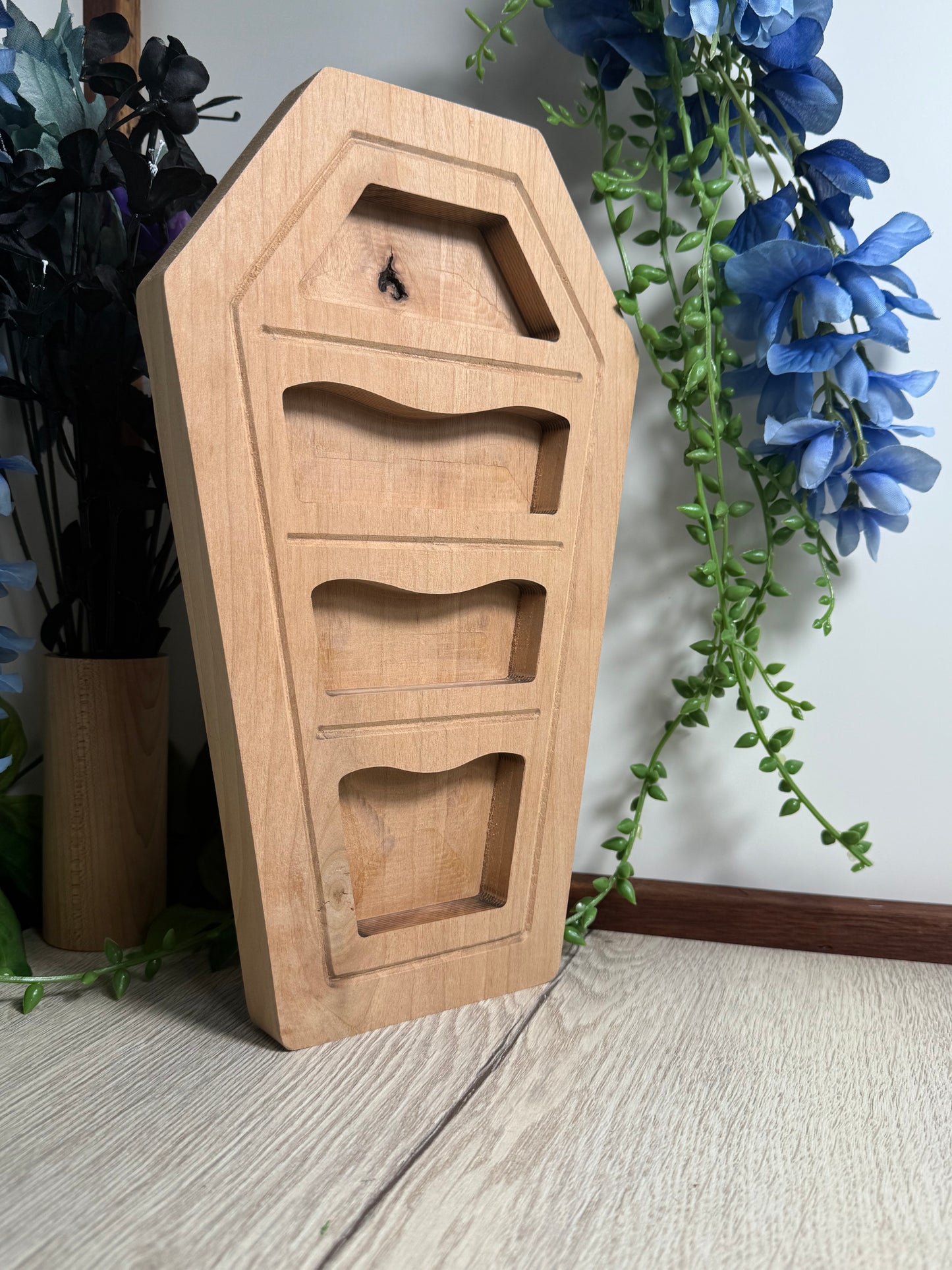 Coffin shaped curio trinket and rock shelf