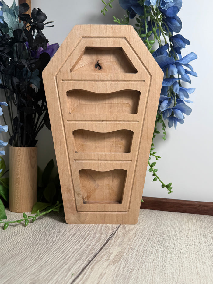 Coffin shaped curio trinket and rock shelf
